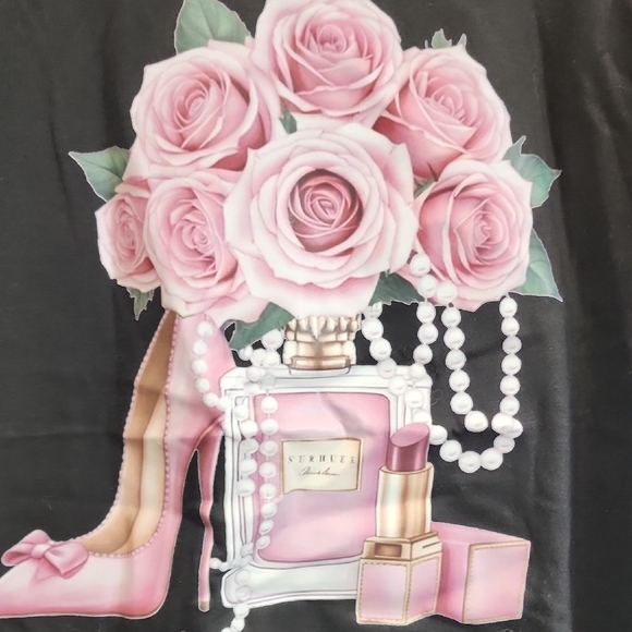 Elegant Black Tee with Pink Floral Perfume Design - Picture 3 of 3